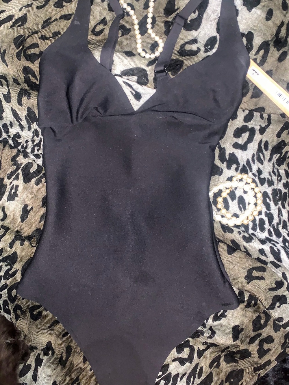 SKIMS Black Sculpting Bodysuit with Light Bust Support